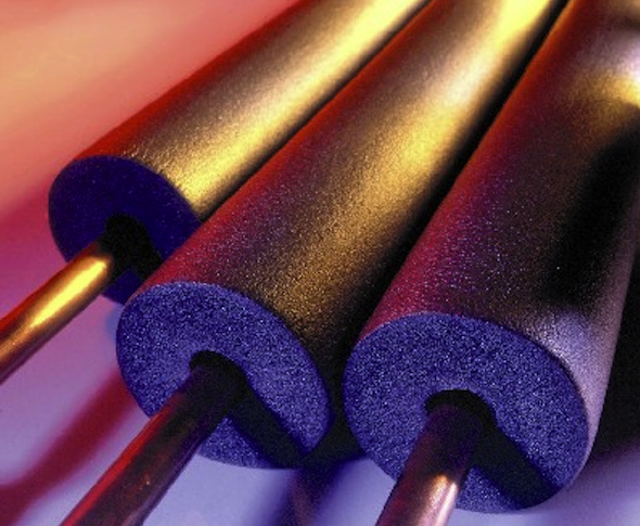 Foam pipe insulation sleeves on copper pipes