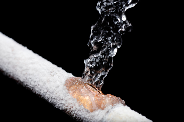 Water spraying from a burst frozen pipe