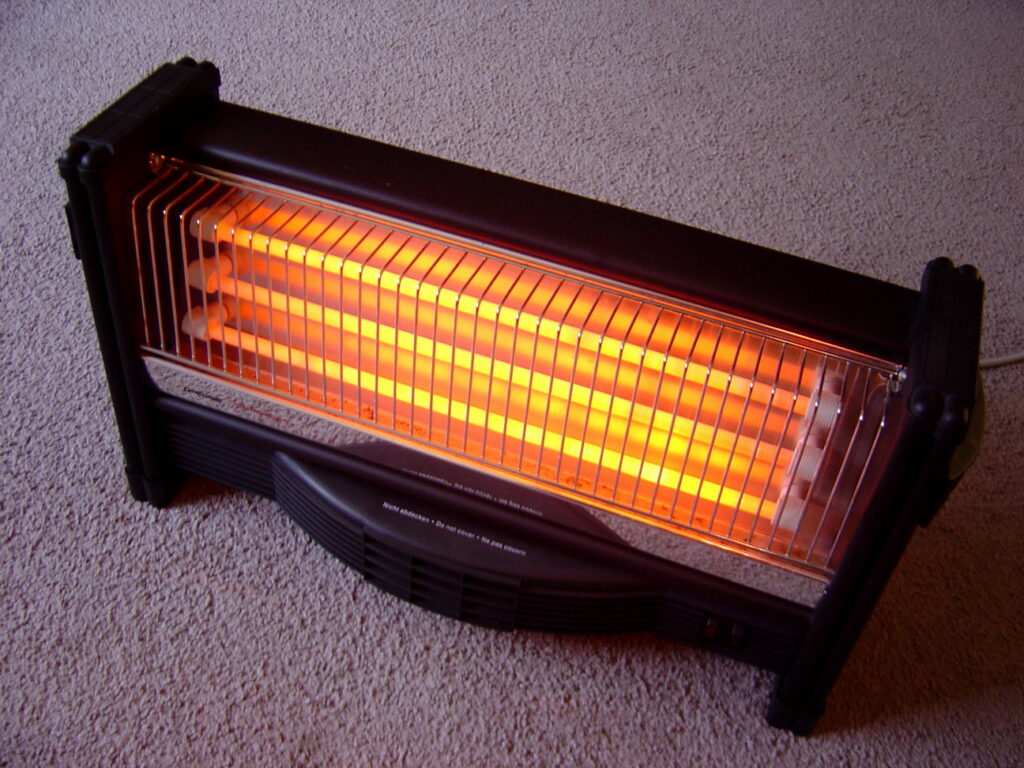 Electric space heater glowing orange